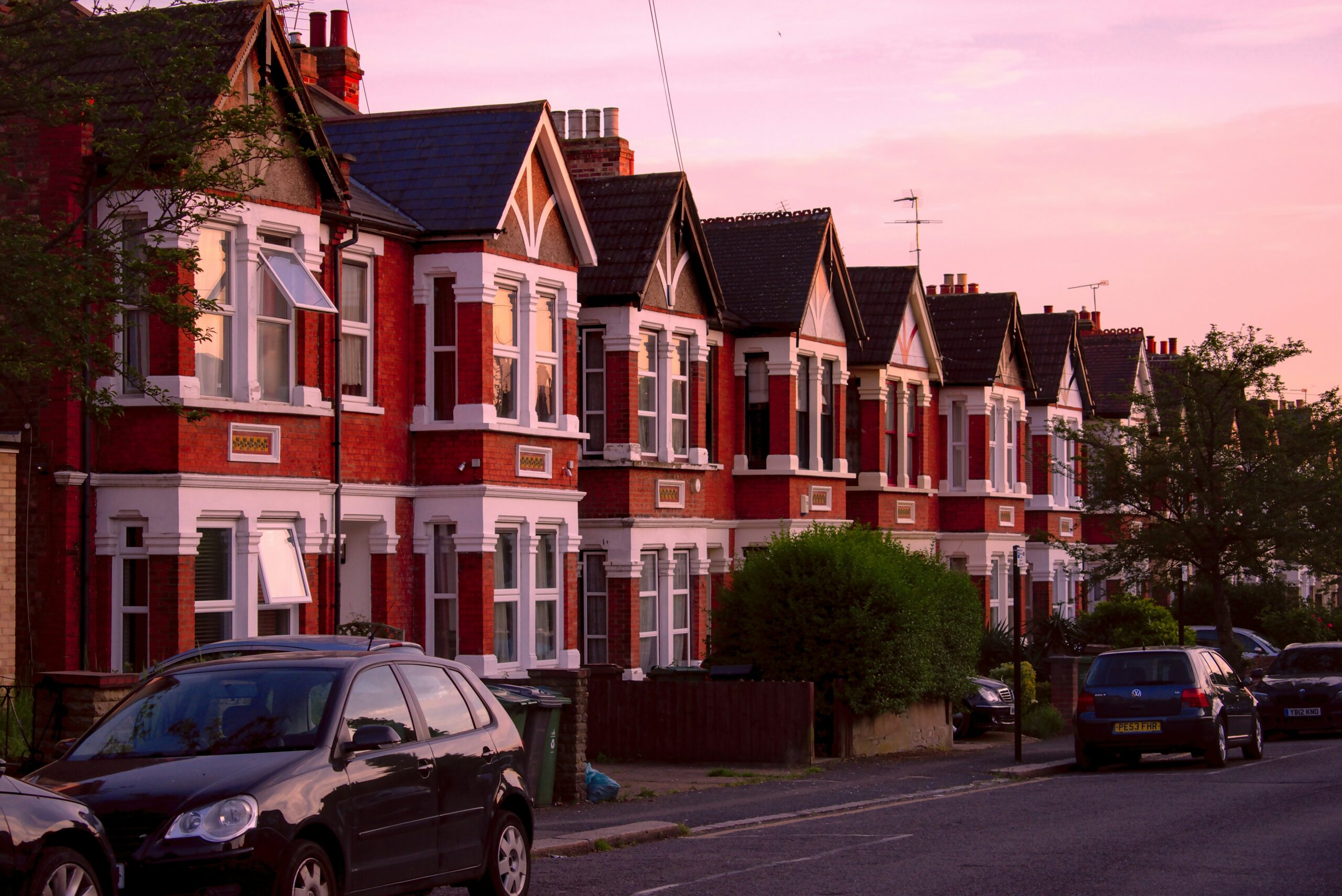 Row of Victorian terraced houses in West London at sunset